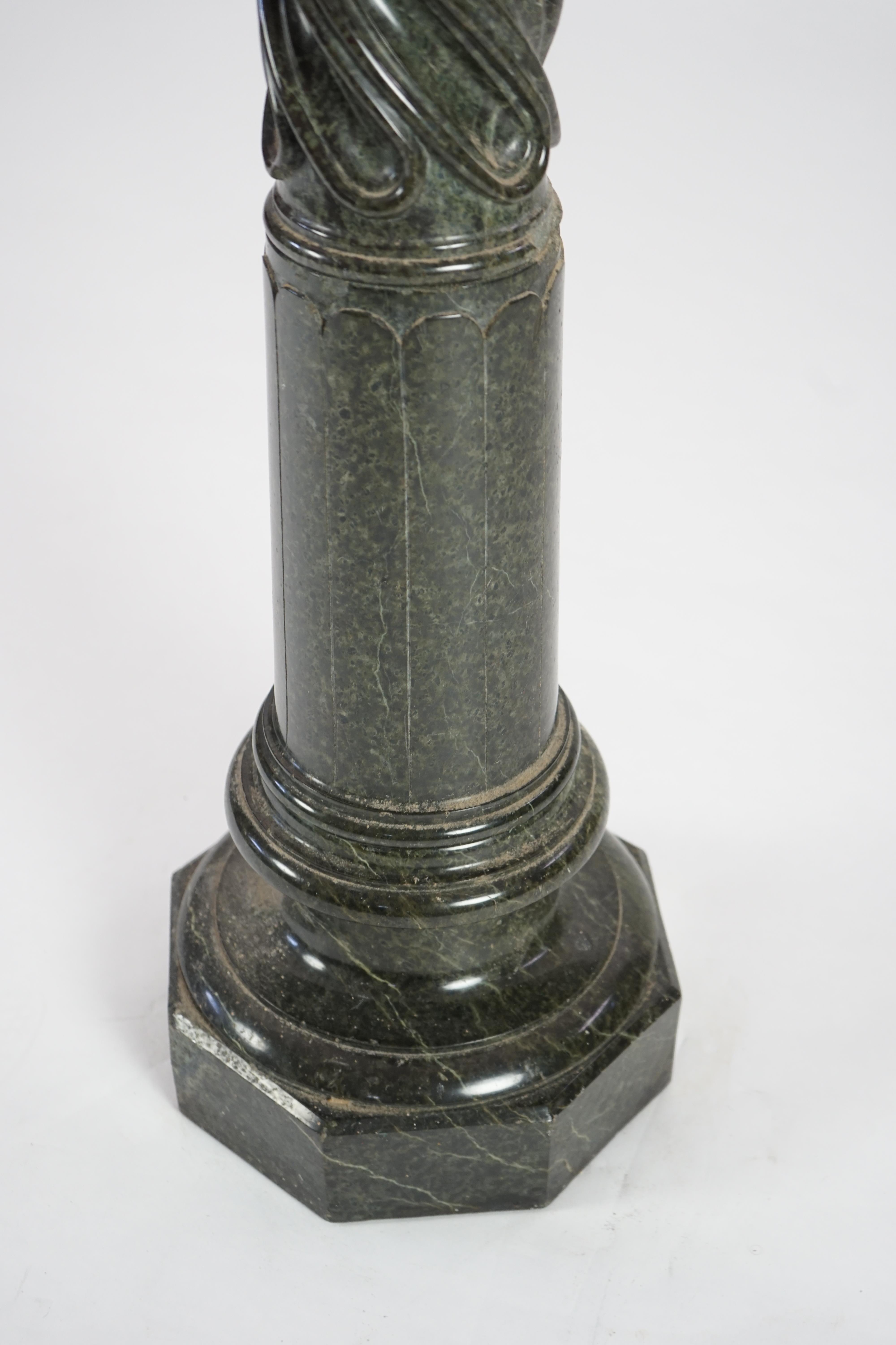 A Victorian green serpentine pedestal with spiral fluted column on octagonal plinth, 110cm high. Condition - fair